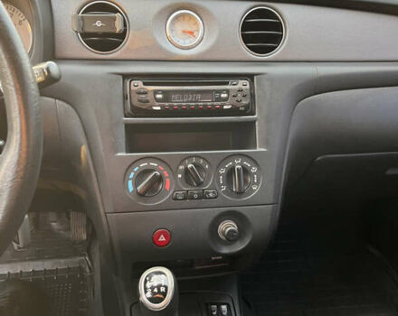 Серый Мицубиси Аутлендер, объемом двигателя 2 л и пробегом 138 тыс. км за 7000 $, фото 23 на Automoto.ua