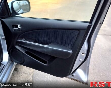 Серый Мицубиси Аутлендер, объемом двигателя 2 л и пробегом 198 тыс. км за 7700 $, фото 11 на Automoto.ua