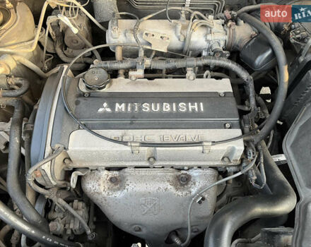 Серый Мицубиси Аутлендер, объемом двигателя 2 л и пробегом 138 тыс. км за 7000 $, фото 28 на Automoto.ua