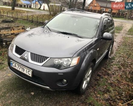 Серый Мицубиси Аутлендер, объемом двигателя 2.4 л и пробегом 198 тыс. км за 9449 $, фото 2 на Automoto.ua