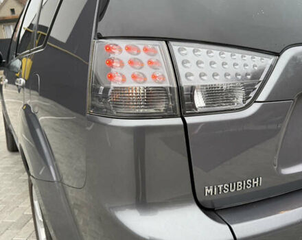 Серый Мицубиси Аутлендер, объемом двигателя 2.2 л и пробегом 162 тыс. км за 10000 $, фото 21 на Automoto.ua