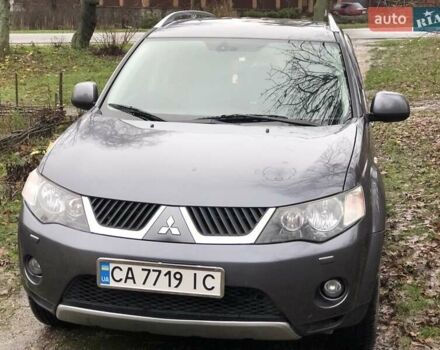 Серый Мицубиси Аутлендер, объемом двигателя 2.4 л и пробегом 198 тыс. км за 9449 $, фото 1 на Automoto.ua