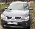 Серый Мицубиси Аутлендер, объемом двигателя 2.4 л и пробегом 198 тыс. км за 9449 $, фото 1 на Automoto.ua