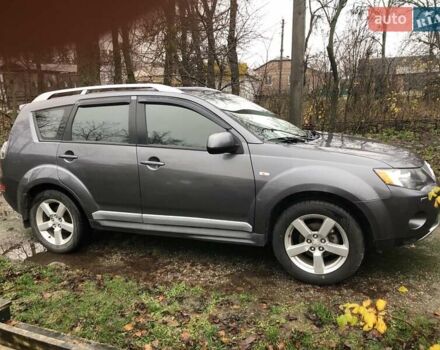 Серый Мицубиси Аутлендер, объемом двигателя 2.4 л и пробегом 198 тыс. км за 9449 $, фото 5 на Automoto.ua