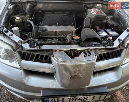 Сірий Міцубісі Аутлендер, об'ємом двигуна 2.38 л та пробігом 127 тис. км за 9999 $, фото 16 на Automoto.ua