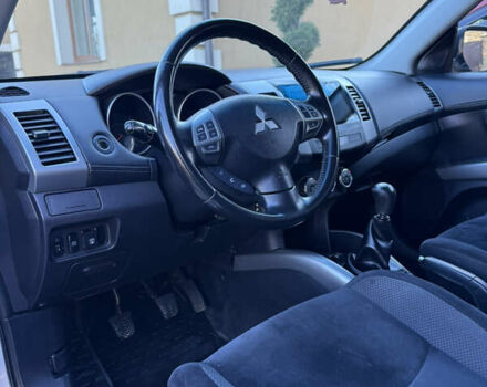 Серый Мицубиси Аутлендер, объемом двигателя 2.4 л и пробегом 218 тыс. км за 9950 $, фото 9 на Automoto.ua