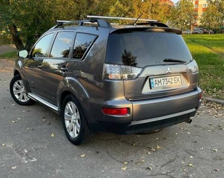 Серый Мицубиси Аутлендер, объемом двигателя 2.4 л и пробегом 321 тыс. км за 9000 $, фото 1 на Automoto.ua