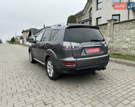 Серый Мицубиси Аутлендер, объемом двигателя 2.2 л и пробегом 217 тыс. км за 10900 $, фото 5 на Automoto.ua