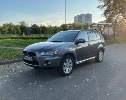 Серый Мицубиси Аутлендер, объемом двигателя 2.4 л и пробегом 138 тыс. км за 9000 $, фото 1 на Automoto.ua