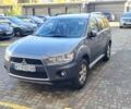 Серый Мицубиси Аутлендер, объемом двигателя 2.3 л и пробегом 294 тыс. км за 9600 $, фото 2 на Automoto.ua