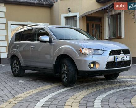 Серый Мицубиси Аутлендер, объемом двигателя 2.4 л и пробегом 218 тыс. км за 9950 $, фото 25 на Automoto.ua