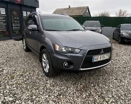Серый Мицубиси Аутлендер, объемом двигателя 2.36 л и пробегом 143 тыс. км за 11500 $, фото 3 на Automoto.ua