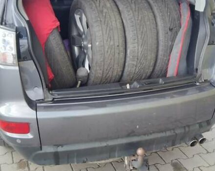 Серый Мицубиси Аутлендер, объемом двигателя 2.3 л и пробегом 294 тыс. км за 9600 $, фото 16 на Automoto.ua