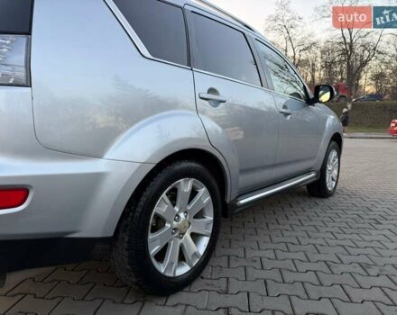 Серый Мицубиси Аутлендер, объемом двигателя 2.18 л и пробегом 294 тыс. км за 10799 $, фото 6 на Automoto.ua