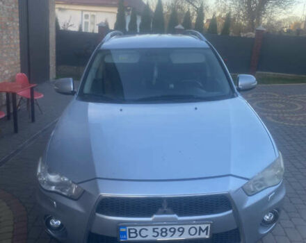 Серый Мицубиси Аутлендер, объемом двигателя 2 л и пробегом 286 тыс. км за 10300 $, фото 1 на Automoto.ua