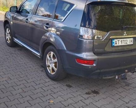 Серый Мицубиси Аутлендер, объемом двигателя 2.3 л и пробегом 294 тыс. км за 9600 $, фото 3 на Automoto.ua