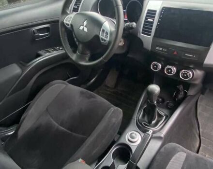 Серый Мицубиси Аутлендер, объемом двигателя 2.36 л и пробегом 143 тыс. км за 11500 $, фото 5 на Automoto.ua