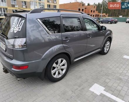Серый Мицубиси Аутлендер, объемом двигателя 2.3 л и пробегом 263 тыс. км за 11400 $, фото 2 на Automoto.ua
