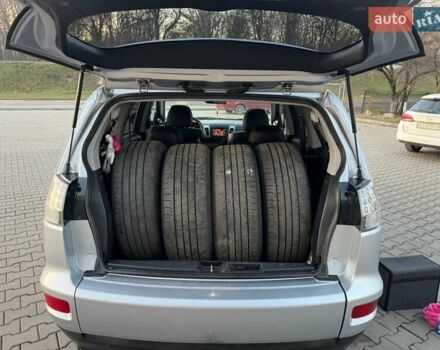 Серый Мицубиси Аутлендер, объемом двигателя 2.18 л и пробегом 294 тыс. км за 10799 $, фото 22 на Automoto.ua