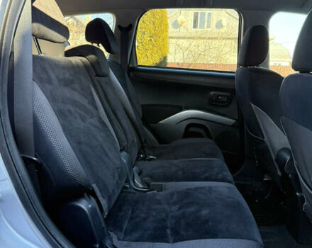 Серый Мицубиси Аутлендер, объемом двигателя 2.4 л и пробегом 218 тыс. км за 9950 $, фото 17 на Automoto.ua