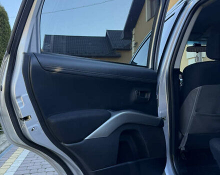 Серый Мицубиси Аутлендер, объемом двигателя 2.4 л и пробегом 218 тыс. км за 9950 $, фото 11 на Automoto.ua