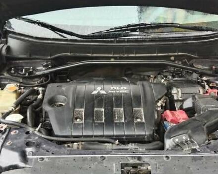 Серый Мицубиси Аутлендер, объемом двигателя 2.3 л и пробегом 294 тыс. км за 9600 $, фото 1 на Automoto.ua