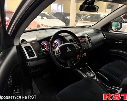 Серый Мицубиси Аутлендер, объемом двигателя 2.4 л и пробегом 182 тыс. км за 10800 $, фото 9 на Automoto.ua