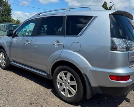 Серый Мицубиси Аутлендер, объемом двигателя 2.1 л и пробегом 225 тыс. км за 11500 $, фото 1 на Automoto.ua