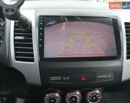 Серый Мицубиси Аутлендер, объемом двигателя 2.3 л и пробегом 263 тыс. км за 11400 $, фото 14 на Automoto.ua