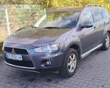 Серый Мицубиси Аутлендер, объемом двигателя 2.3 л и пробегом 294 тыс. км за 9600 $, фото 6 на Automoto.ua
