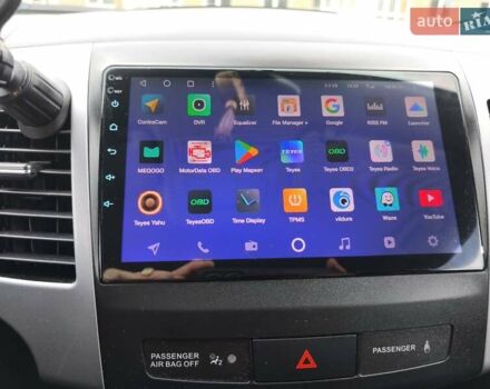 Серый Мицубиси Аутлендер, объемом двигателя 2.3 л и пробегом 263 тыс. км за 11400 $, фото 13 на Automoto.ua