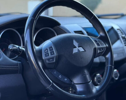 Серый Мицубиси Аутлендер, объемом двигателя 2.4 л и пробегом 218 тыс. км за 9950 $, фото 10 на Automoto.ua