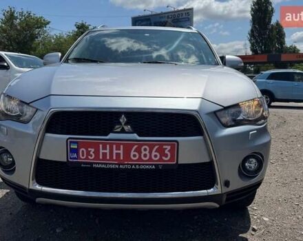 Серый Мицубиси Аутлендер, объемом двигателя 2.2 л и пробегом 223 тыс. км за 11500 $, фото 4 на Automoto.ua