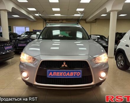 Серый Мицубиси Аутлендер, объемом двигателя 2.4 л и пробегом 182 тыс. км за 10800 $, фото 1 на Automoto.ua