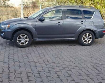 Серый Мицубиси Аутлендер, объемом двигателя 2.3 л и пробегом 294 тыс. км за 9600 $, фото 8 на Automoto.ua