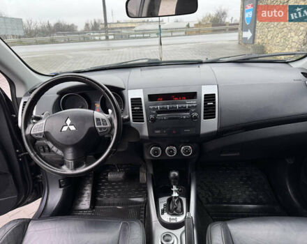 Серый Мицубиси Аутлендер, объемом двигателя 2.2 л и пробегом 230 тыс. км за 11000 $, фото 17 на Automoto.ua