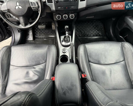 Серый Мицубиси Аутлендер, объемом двигателя 2.2 л и пробегом 230 тыс. км за 11000 $, фото 18 на Automoto.ua