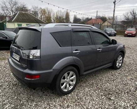 Серый Мицубиси Аутлендер, объемом двигателя 2.36 л и пробегом 143 тыс. км за 11500 $, фото 1 на Automoto.ua