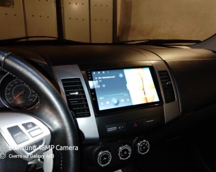 Серый Мицубиси Аутлендер, объемом двигателя 2.4 л и пробегом 151 тыс. км за 11100 $, фото 9 на Automoto.ua