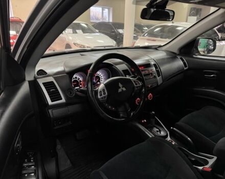 Серый Мицубиси Аутлендер, объемом двигателя 2.4 л и пробегом 182 тыс. км за 10800 $, фото 9 на Automoto.ua