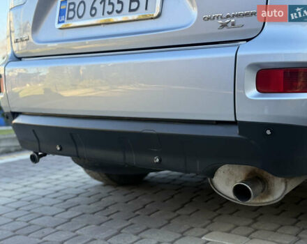 Серый Мицубиси Аутлендер, объемом двигателя 2.4 л и пробегом 218 тыс. км за 9950 $, фото 23 на Automoto.ua