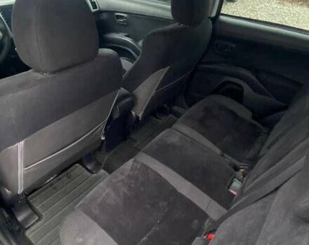 Серый Мицубиси Аутлендер, объемом двигателя 2.36 л и пробегом 143 тыс. км за 11500 $, фото 2 на Automoto.ua