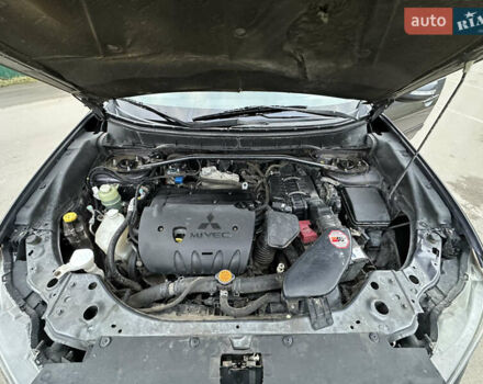 Серый Мицубиси Аутлендер, объемом двигателя 2.4 л и пробегом 270 тыс. км за 8450 $, фото 24 на Automoto.ua