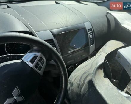 Серый Мицубиси Аутлендер, объемом двигателя 2 л и пробегом 150 тыс. км за 3800 $, фото 2 на Automoto.ua