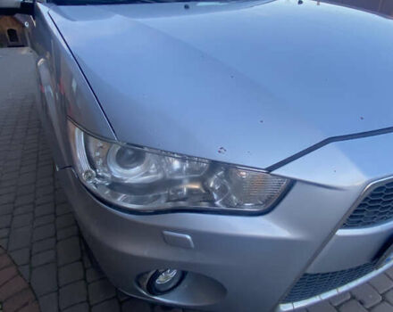 Серый Мицубиси Аутлендер, объемом двигателя 2 л и пробегом 286 тыс. км за 10300 $, фото 7 на Automoto.ua