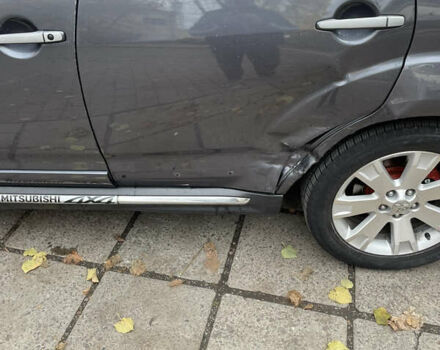 Серый Мицубиси Аутлендер, объемом двигателя 2 л и пробегом 264 тыс. км за 9500 $, фото 9 на Automoto.ua