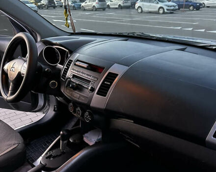 Мицубиси Аутлендер 2010 в Белой Церкве на Automoto.ua Серый Мицубиси Аутлендер, объемом двигателя 2.36 л и пробегом 220 тыс. км за 9000 $, фото 20 на Automoto.ua