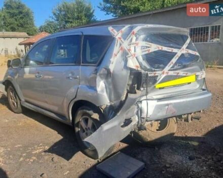 Серый Мицубиси Аутлендер, объемом двигателя 2 л и пробегом 150 тыс. км за 3800 $, фото 5 на Automoto.ua