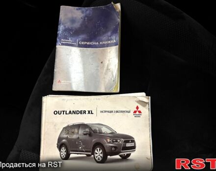 Серый Мицубиси Аутлендер, объемом двигателя 2.4 л и пробегом 182 тыс. км за 10800 $, фото 13 на Automoto.ua