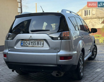 Серый Мицубиси Аутлендер, объемом двигателя 2.4 л и пробегом 218 тыс. км за 9950 $, фото 26 на Automoto.ua